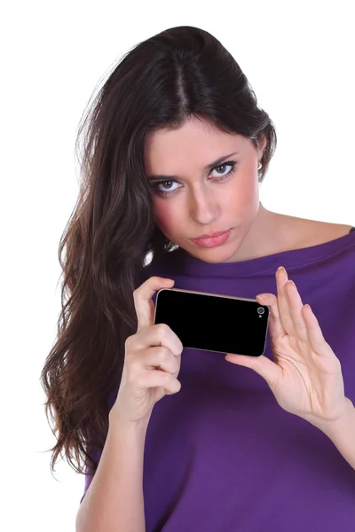Chica posando para una fotografía tomada de su teléfono celular —  Fotos de Stock