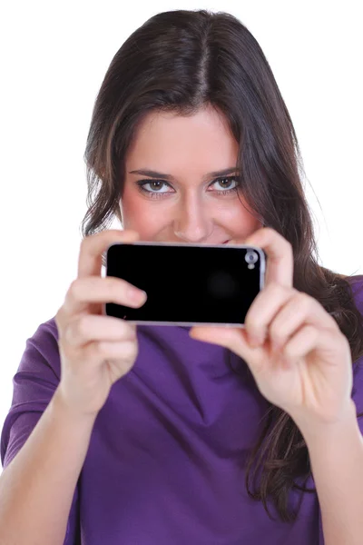 Девушка позирует для фотографии, сделанной с его мобильного телефона — стоковое фото