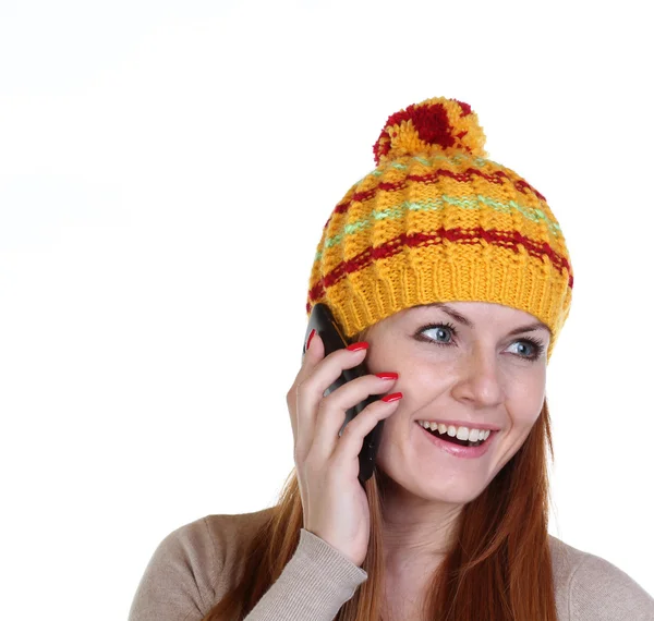Young woman in a knitted hat — Stock Photo, Image