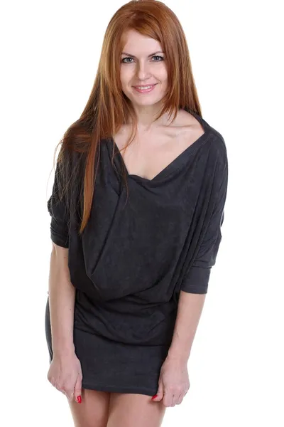Mooie redhead vrouw in een jurk — Stockfoto