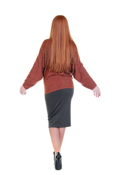 Jovem mulher em uma saia e blusa — Fotografia de Stock