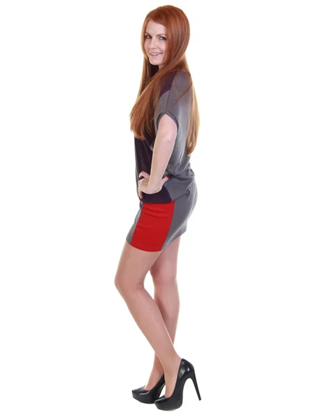 Glad ung kvinna i en kjol och blus — Stockfoto