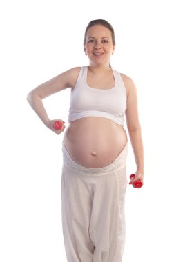 güzel bir hamile kadın egzersizleri yapıyor