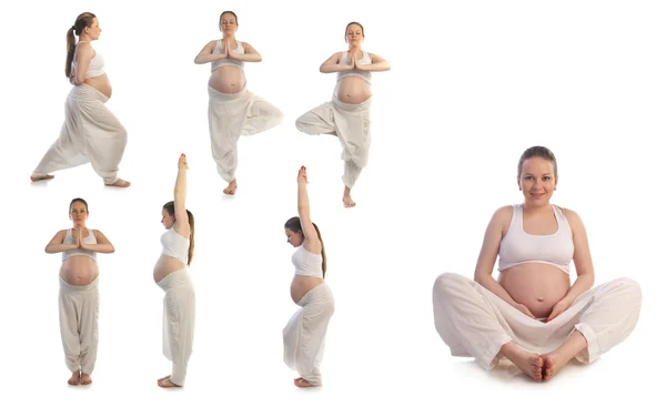 Schöne schwangere Frau macht Yoga-Übungen. — Stockfoto