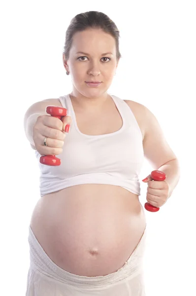 Piękna kobieta w ciąży robi ćwiczenia — Zdjęcie stockowe