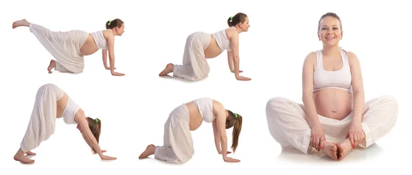 Красивая беременная женщина делает упражнения — стоковое фото