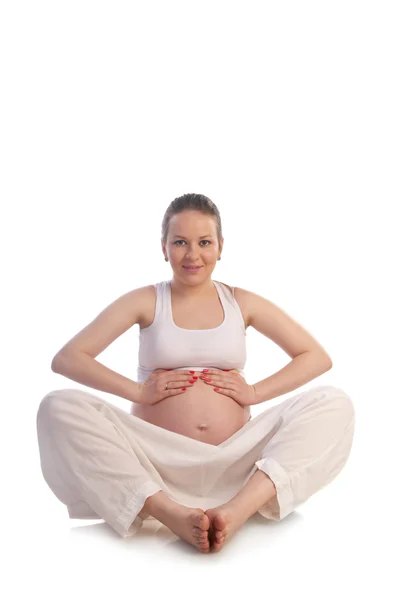 怀孕妇女用手触摸腹部 — 图库照片
