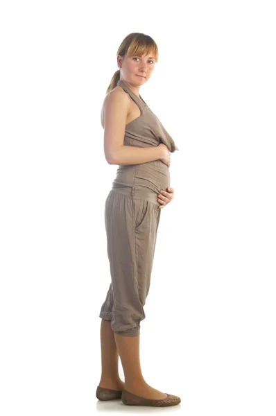 Piękna w ciąży na białym tle — Zdjęcie stockowe