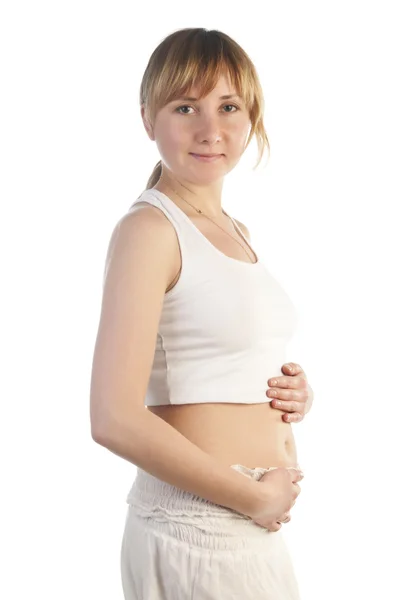 Bela grávida no fundo branco — Fotografia de Stock