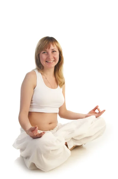 Young pregnant woman doing yoga exercise — Stock Photo, Image