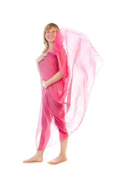 Hermosa mujer joven embarazada en vestido de soplado rosa —  Fotos de Stock