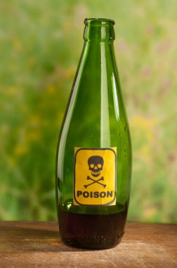 Poison bottle with label clipart