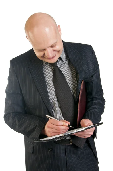 Бизнесмен держит папку на белом фоне — стоковое фото