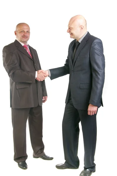 Dos personas de negocios estrechando las manos — Foto de Stock