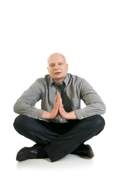 Geschäftsmann meditiert in Lotus-Position — Stockfoto