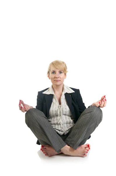 Business woman doing yoga. — Stock Photo, Image