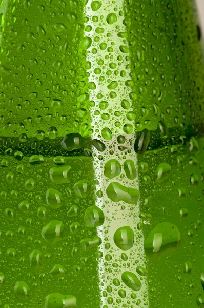 Textuur water druppels op de fles — Gratis stockfoto