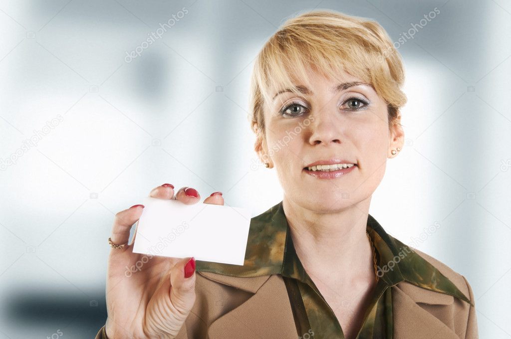 Portrait of business woman giving blank business card.