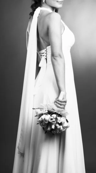 Die Braut mit einem Brautstrauß — Stockfoto