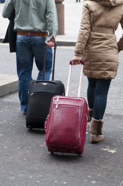 Travelers with suitcases clipart