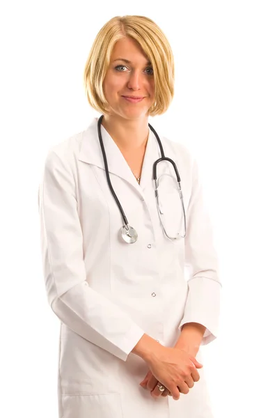 Mosolygó orvosnő sztetoszkóppal. Elszigetelt fehér háttér felett — Stock Fotó
