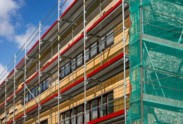 Scaffolding for a renovation of an old house — Stock Photo, Image