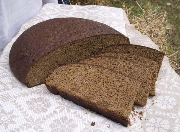 Fresh homemade black round rye bread — Stock Photo, Image