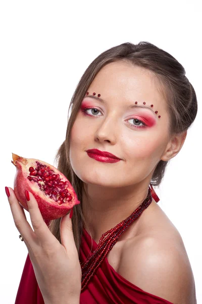 Kvinna med granatäpple — Stockfoto