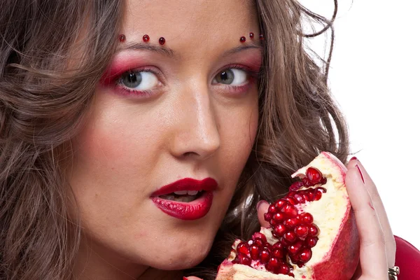 Woman with pomegranate — Stock Photo, Image