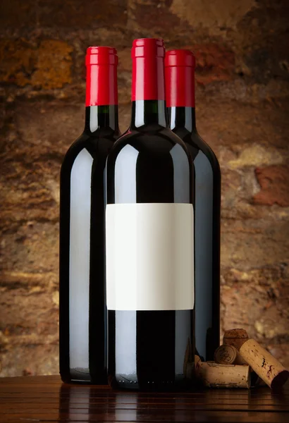 Flaskor rött vin — Stockfoto