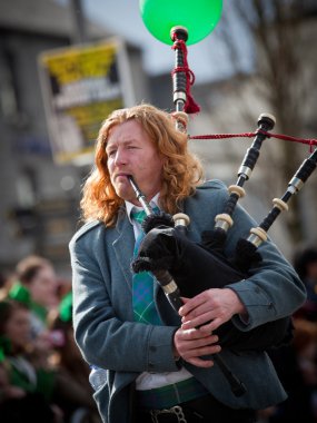 Bagpipes musician performs at the St.Patrick clipart