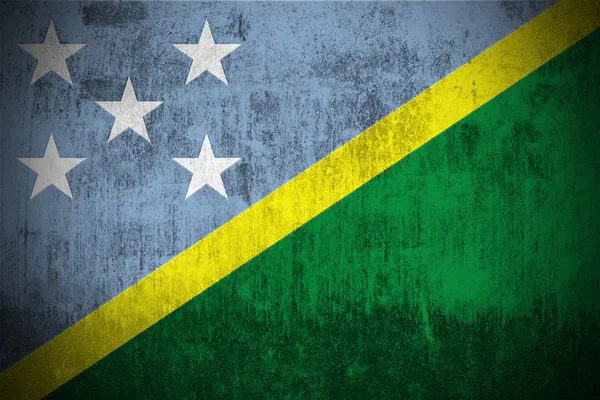Grunge vlajka Šalamounových ostrovů — Stock fotografie
