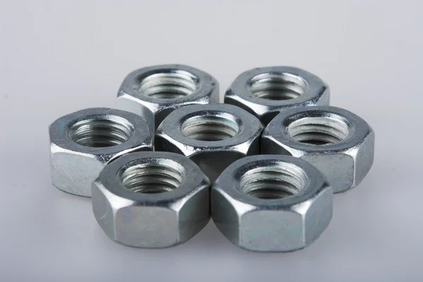 Heap of screw nuts — Stock Photo, Image