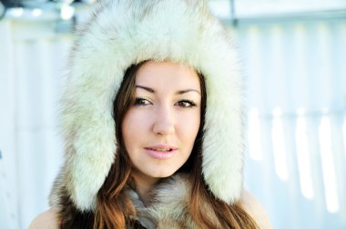 Girl wearing fur hat