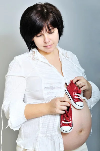 Mulher grávida pensativa — Fotografia de Stock
