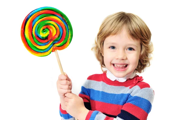 Laughing girl with candy Stock Photo