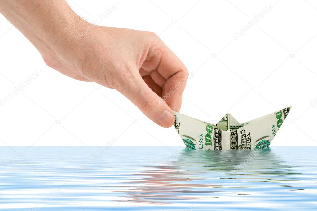 Hand launching money ship