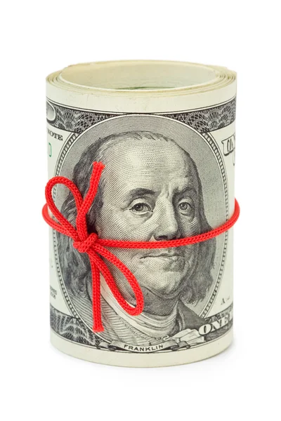 Roll of money and bow — Stock Photo, Image
