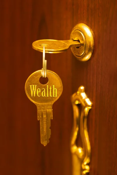 Golden key Wealth — Stock Photo, Image