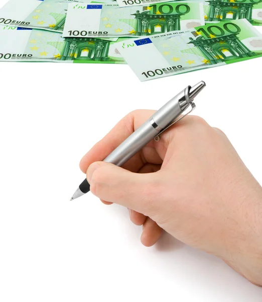 Mão com caneta e dinheiro — Fotografia de Stock