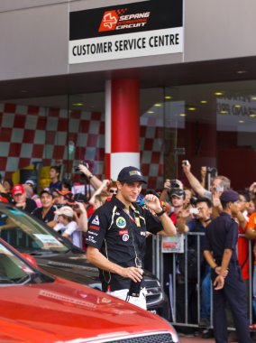 SEPANG, MALAYSIA - APRIL 10: Vitaly Petrov (team Lotus Renault) clipart