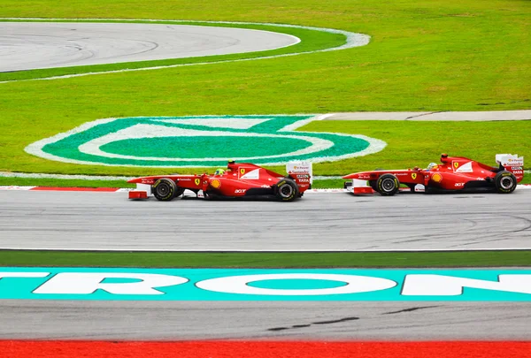SEPANG, MALAYSIA - APRIL 10: Ferrari cars on track at race of Fo — Stock Photo, Image