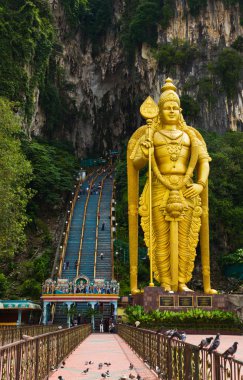 Statue of god Muragan at Batu caves, Kuala-Lumpur, Malaysia clipart