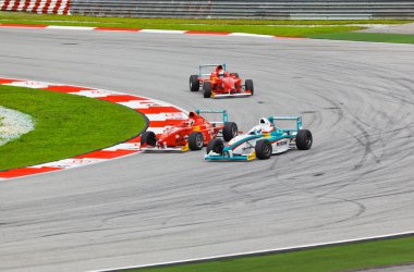 SEPANG, MALAYSIA - APRIL 10: Cars on track at race of JK Racing clipart