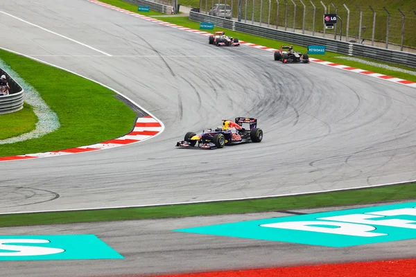 SEPANG, MALAYSIA - APRIL 10: Cars on track at race of Formula 1 — Stock Photo, Image