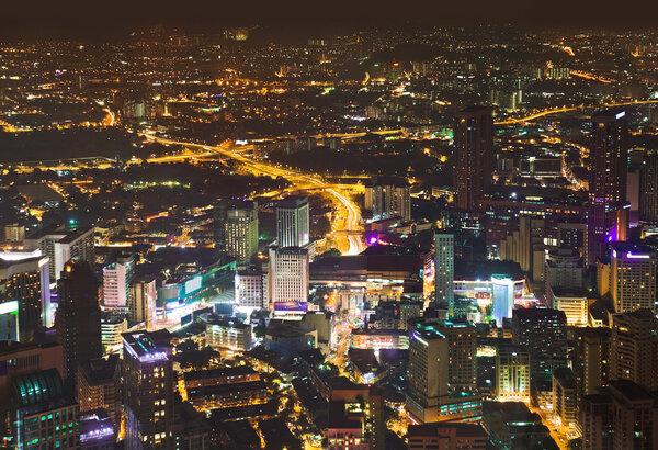 View to Kuala Lumpur (Malaysia) at night - architecture background