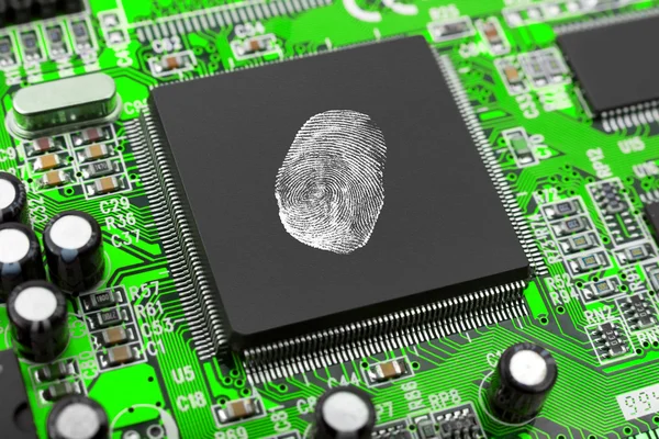 Відбиток пальця на чипі комп'ютера — стокове фото
