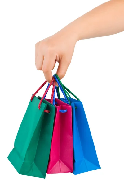 Hand met shopping tassen — Stockfoto