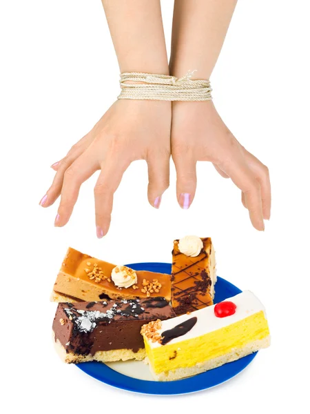 Kuchen und gebundene Hände — Stockfoto