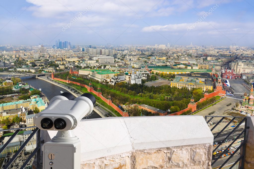 Binoculars and Moscow Kremlin
